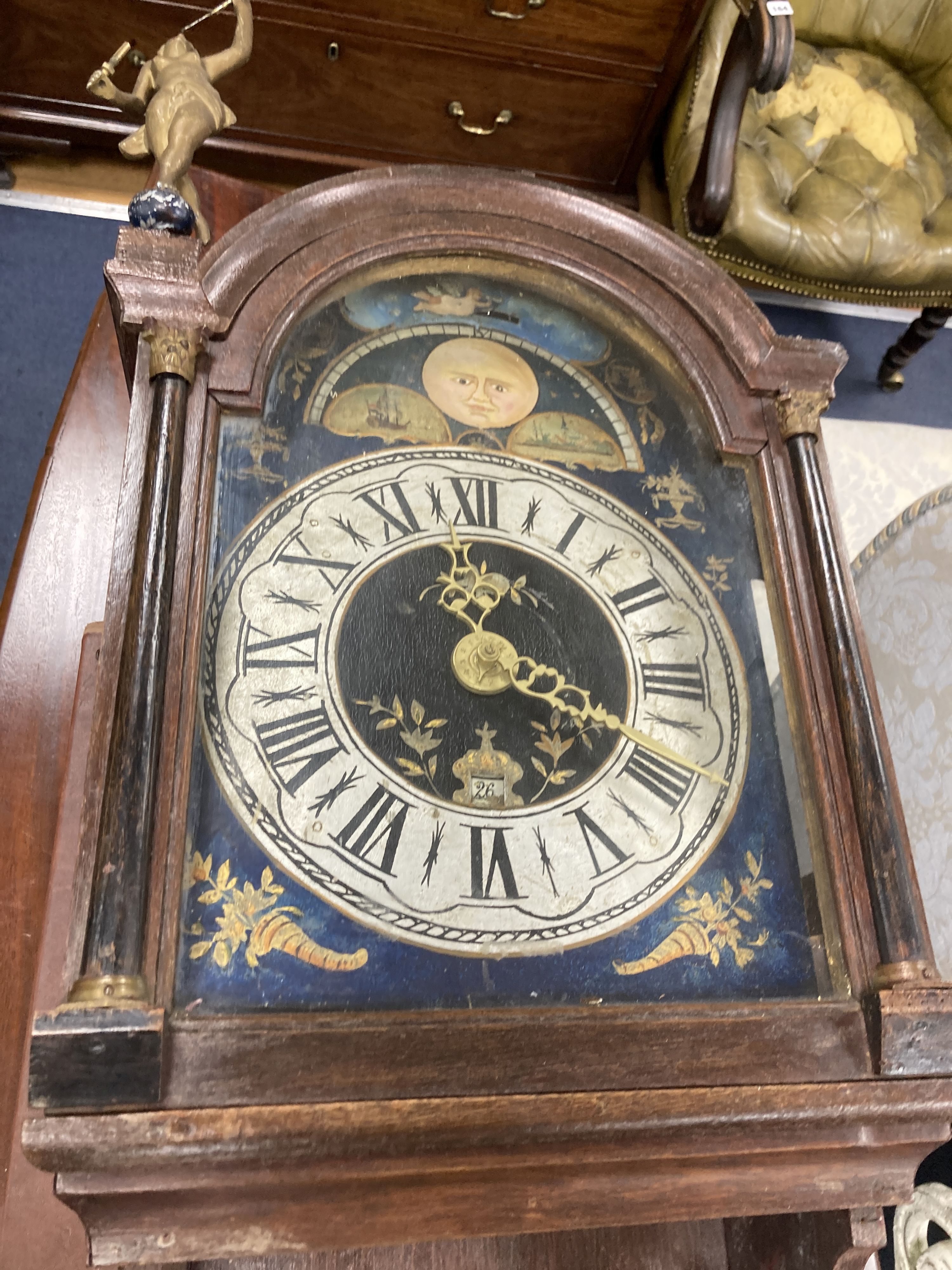 A wall clock with painted dial, height 132cm